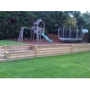 timber retaining wall around children's play area