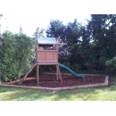 new wooden school play area with wood chippings