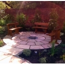 close up of circular paving and seating area