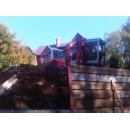 timber retaining wall around property