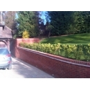 brick retaining wall around driveway