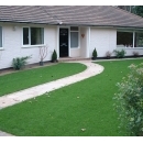 paved walkway leading to a client's home