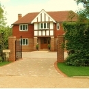 gated surrey home with new block paved driveway